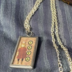 Queen Java double sided pendant with silver chain